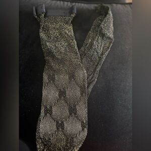 Brand new Gucci logo tights Black and Gold size large